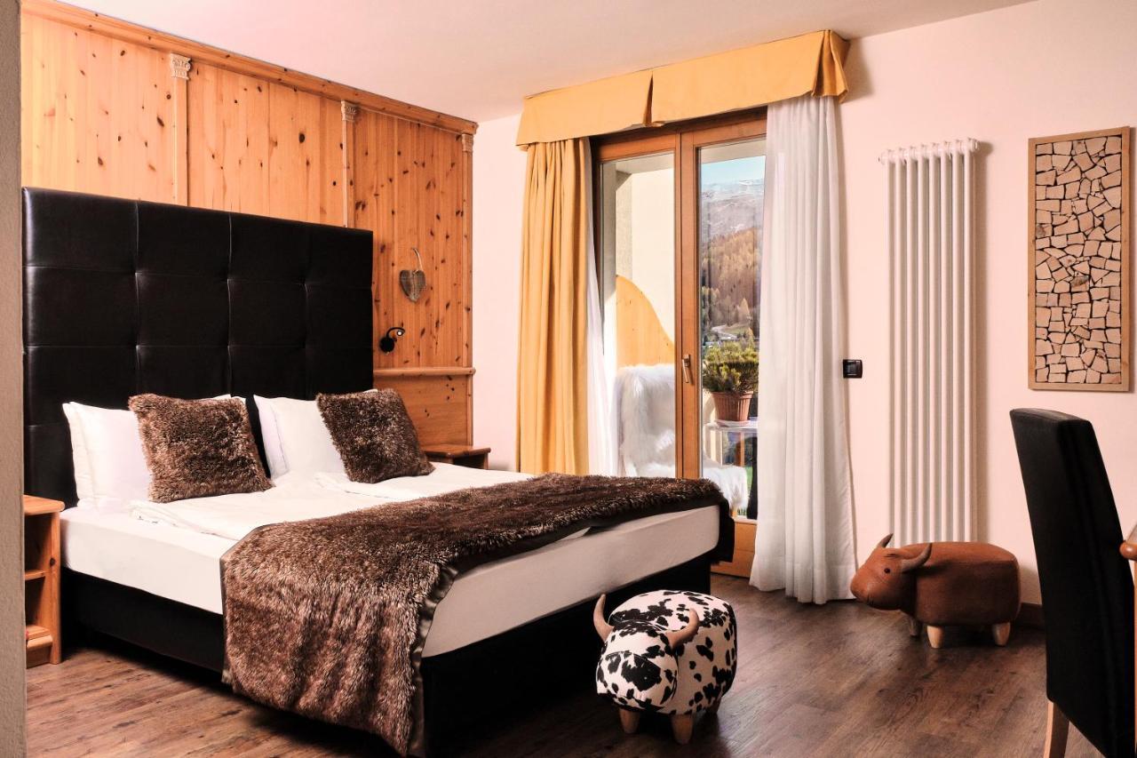 Boutique Hotel E Chalets Salvadori Mezzana  Pokoj fotografie